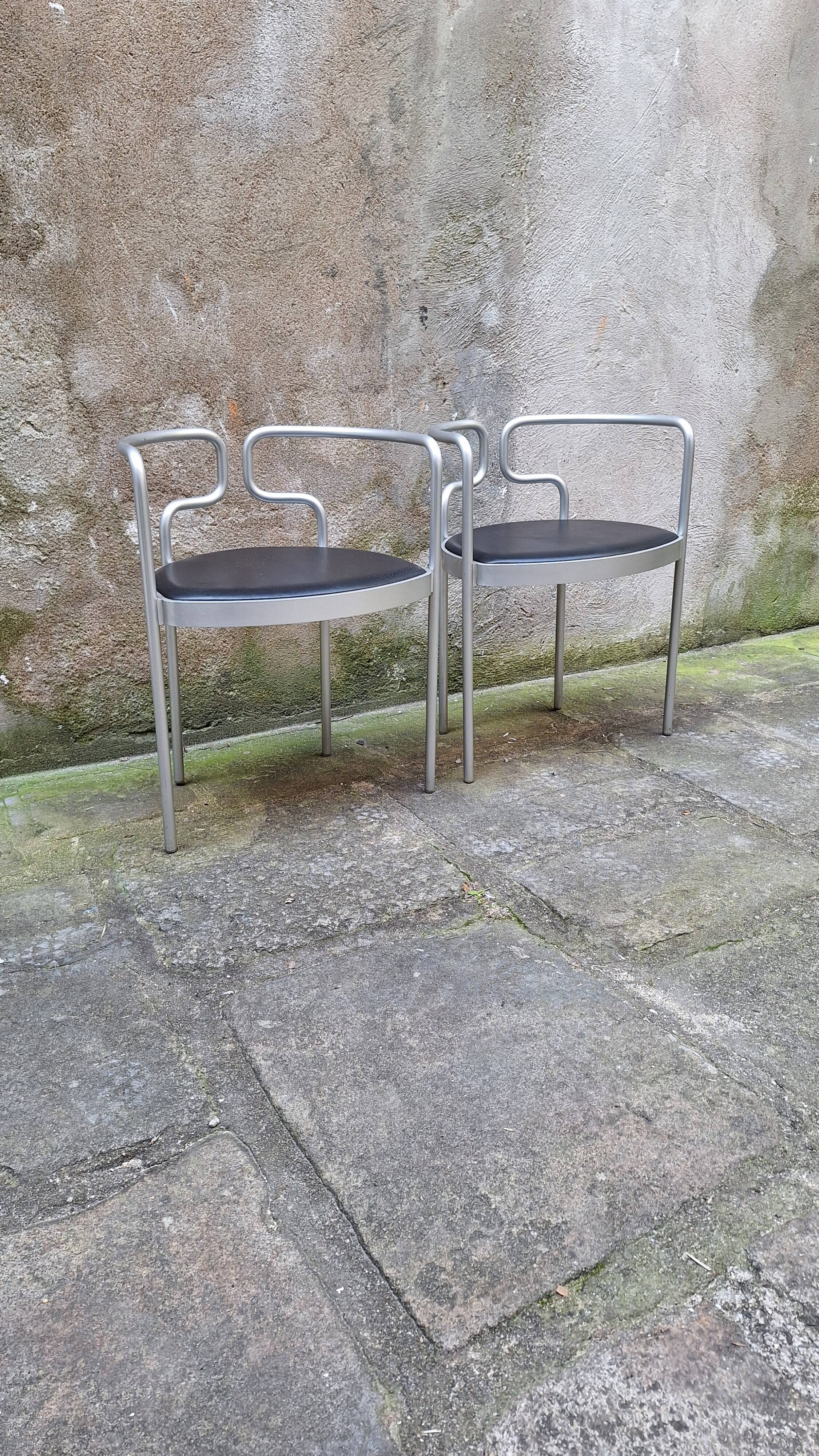 Pair of aluminum armchairs by Henning Larsen