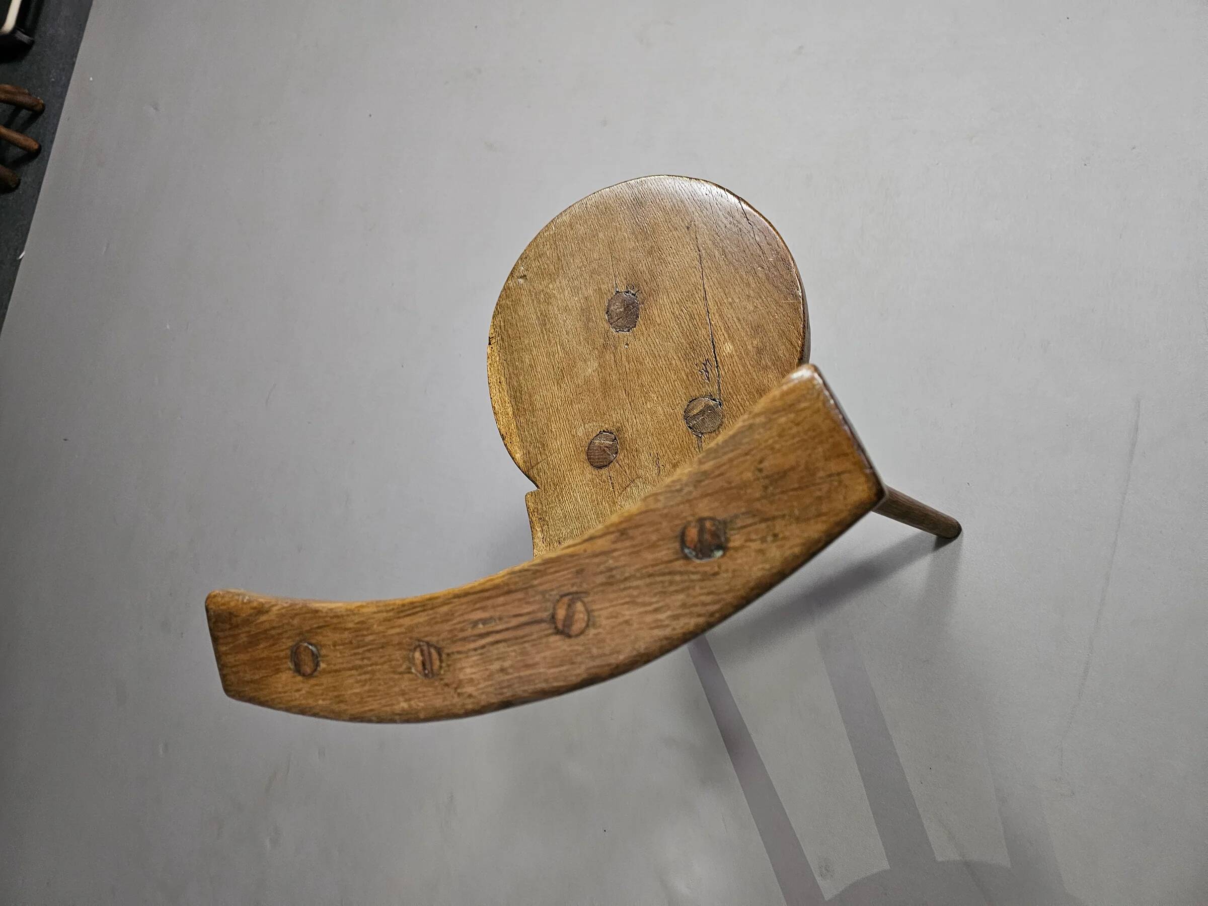 Old farmers tripod chair for decorative use