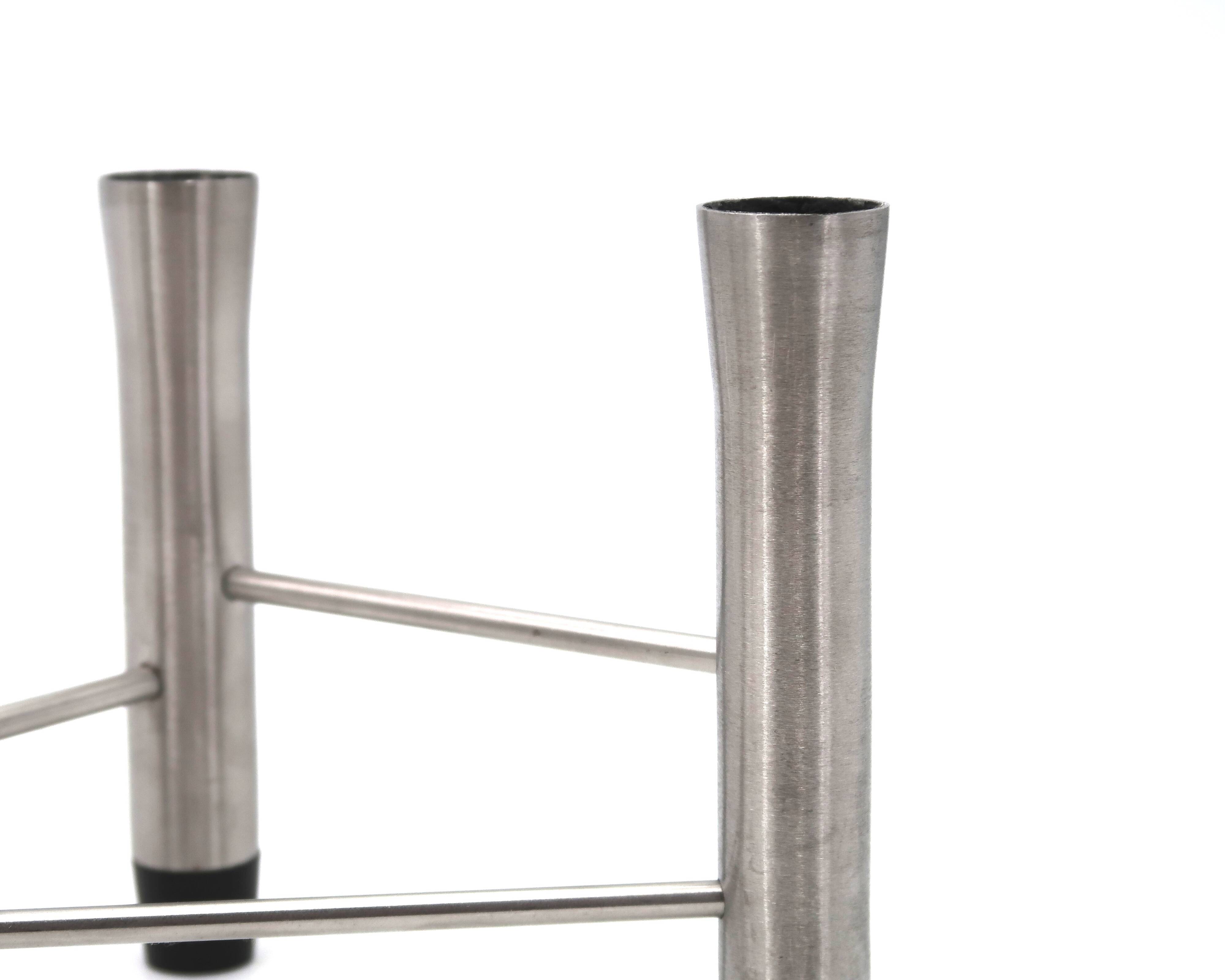 Pair of brushed steel tripod candlesticks, 1970s