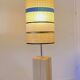 Solid oak floor lamp with a designer shade