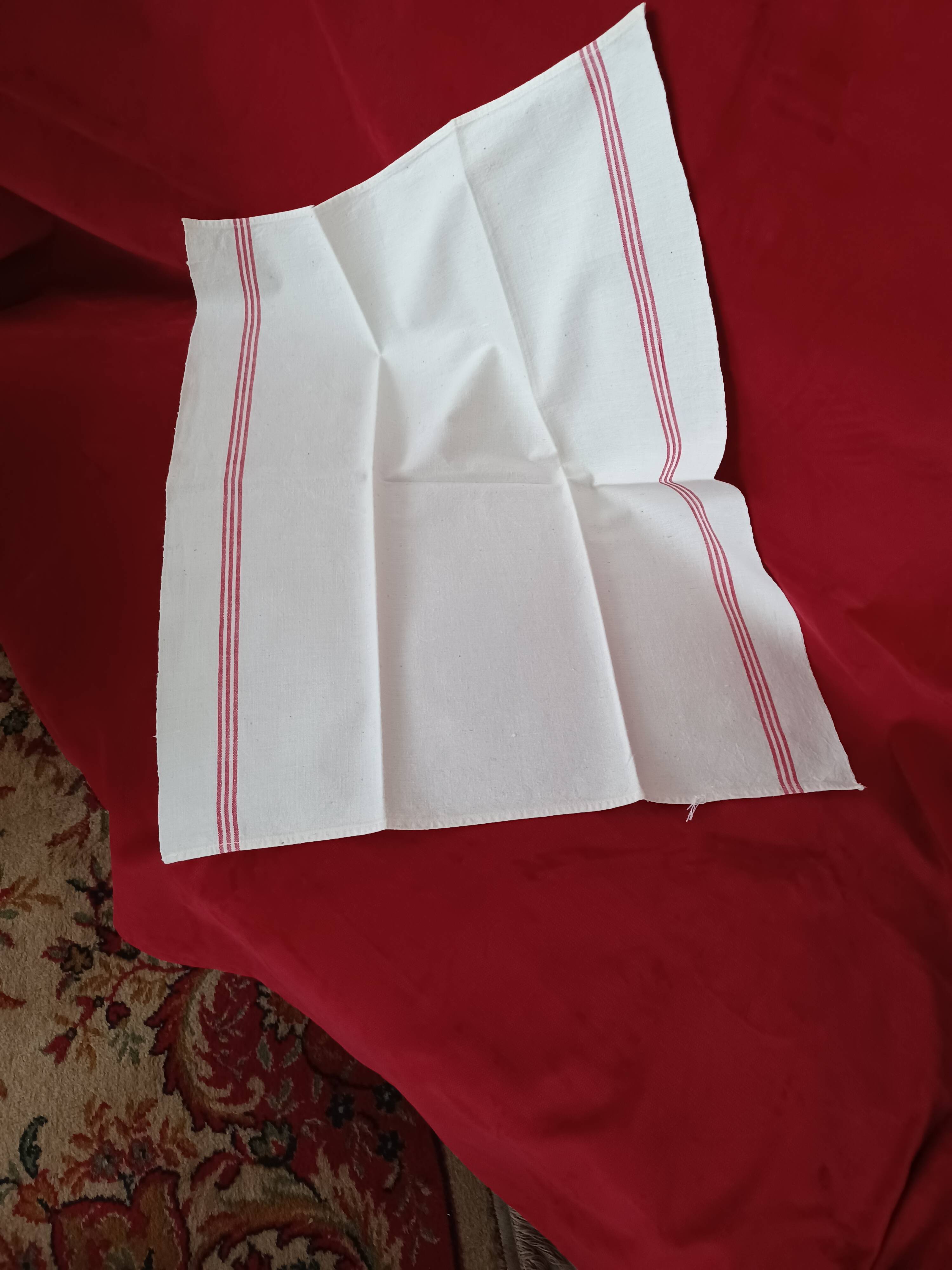 Old red battens tea towels