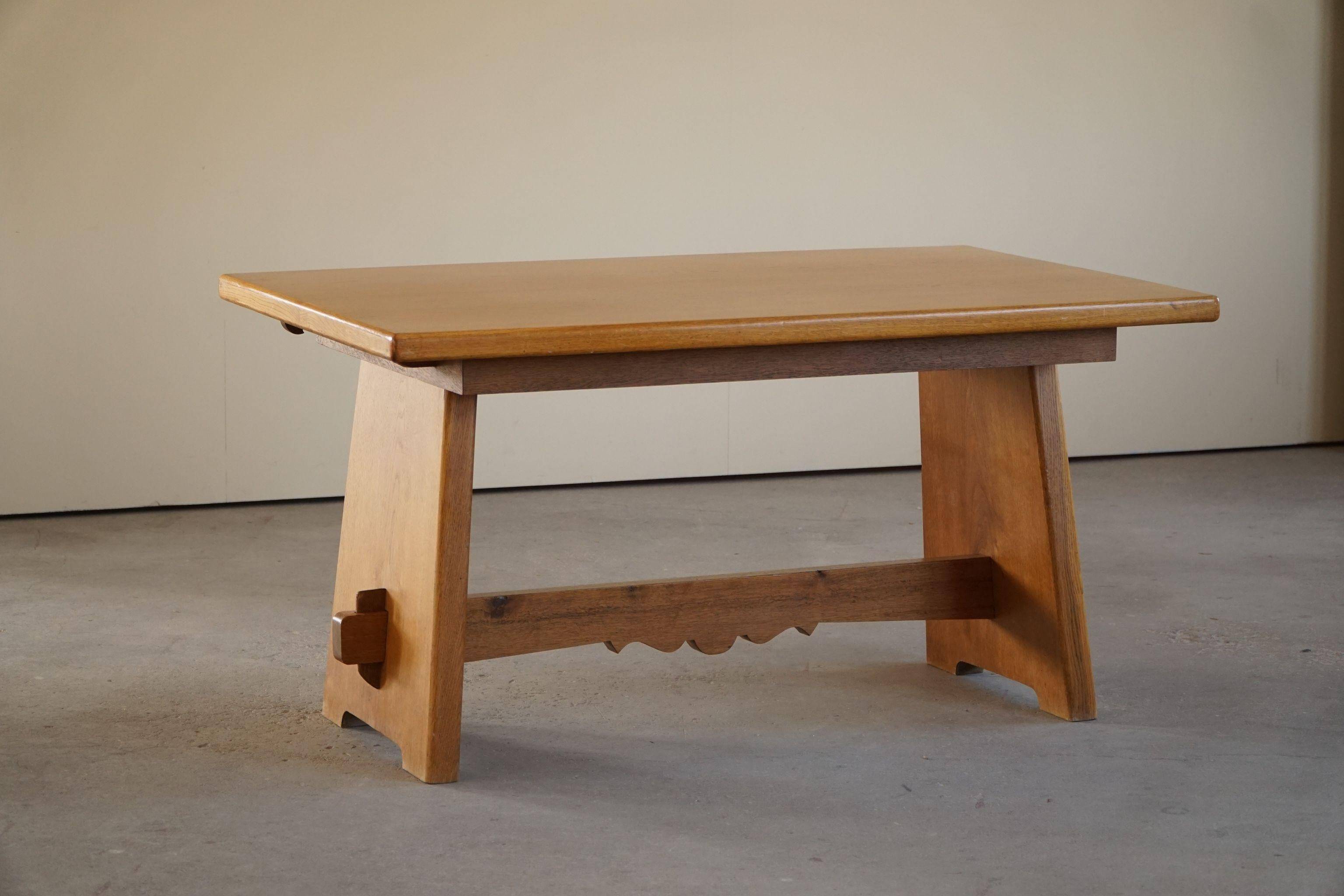 Mid-century brutalist dining table, made of oak, Danish craftsmanship, 1950s.