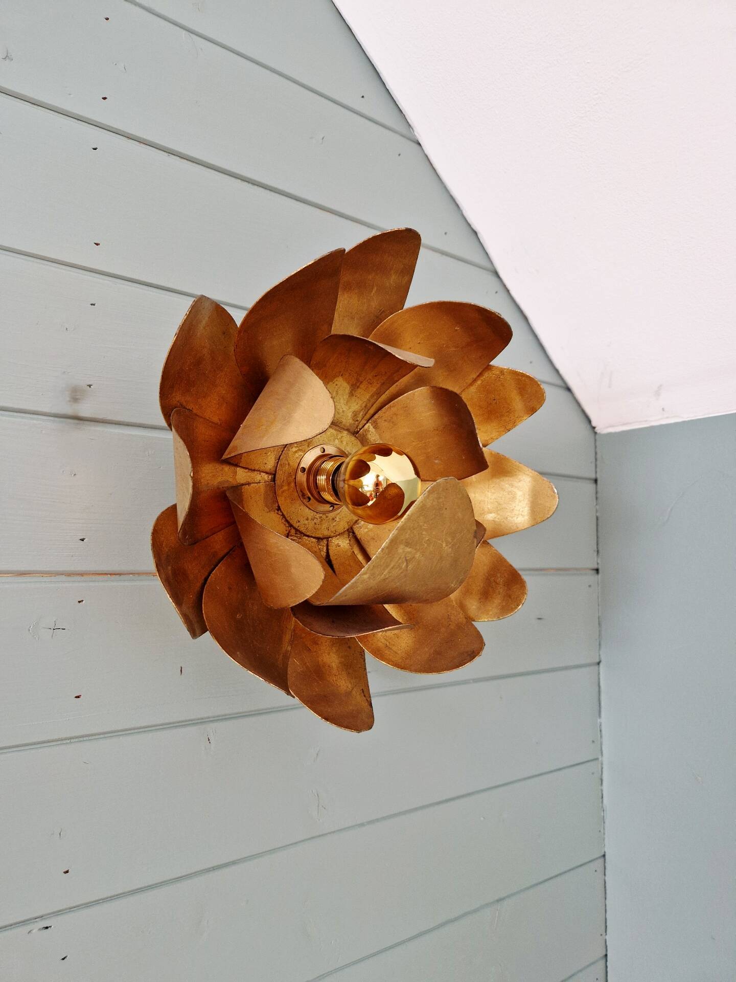 Gold metal floral wall light, 1960-70.