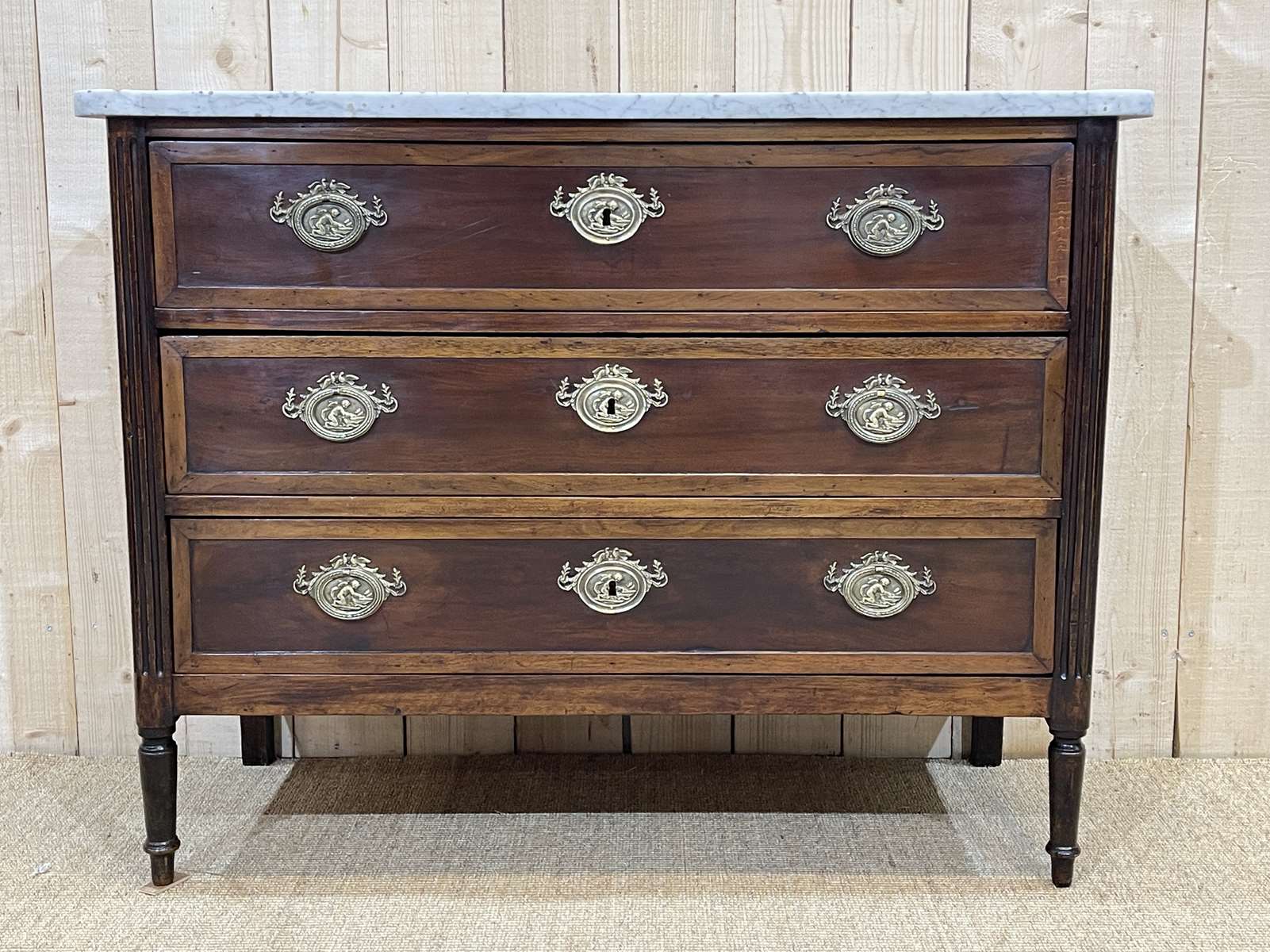 Louis XVI XIXth chest of drawers in mahogany and walnut and white marble top