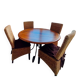 Round wooden table with wrought iron legs.
