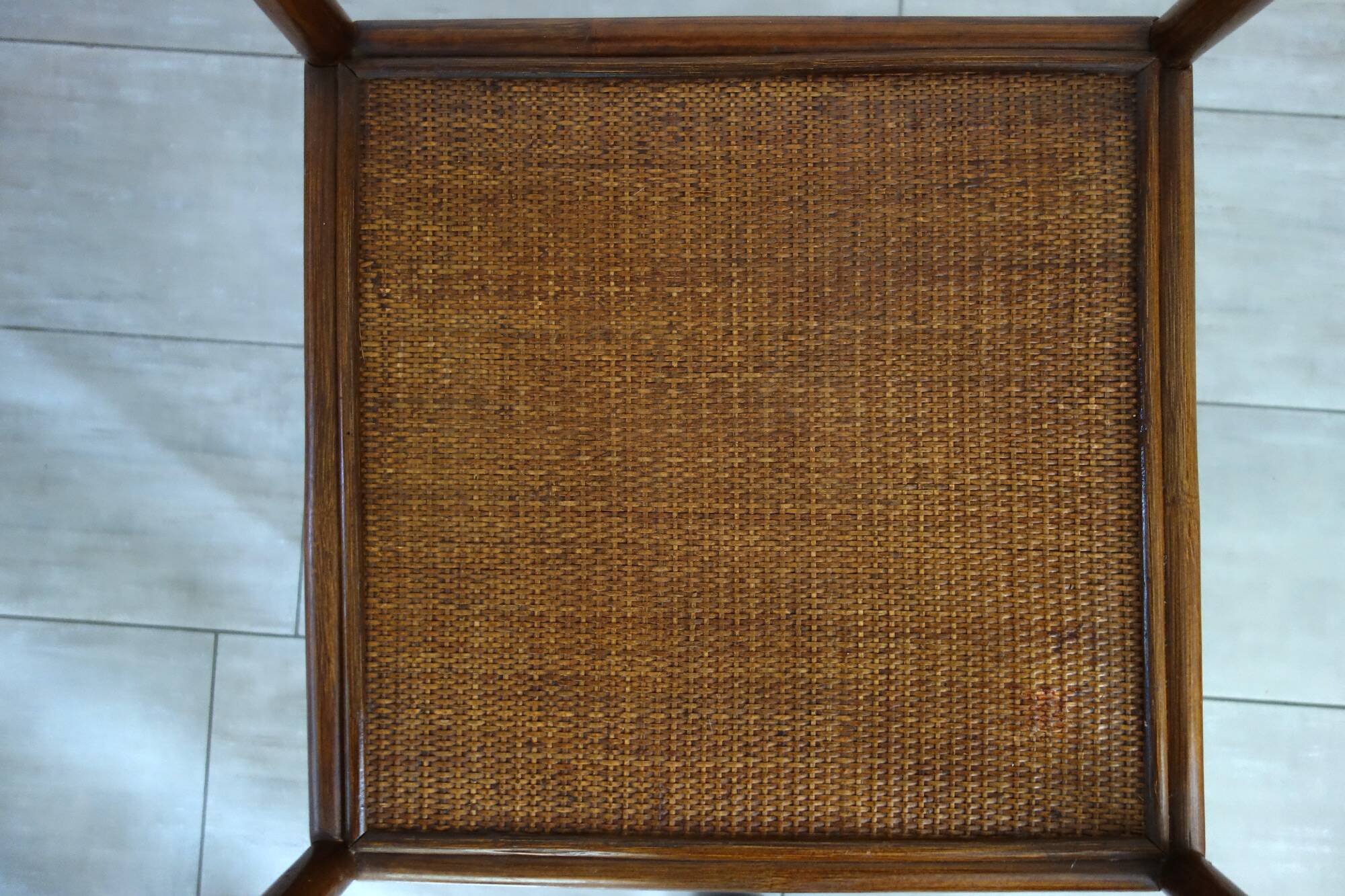 Rattan set with table and two armchairs.