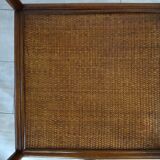 Rattan set with table and two armchairs.