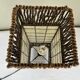 Capiz shell lamp and woven twigs