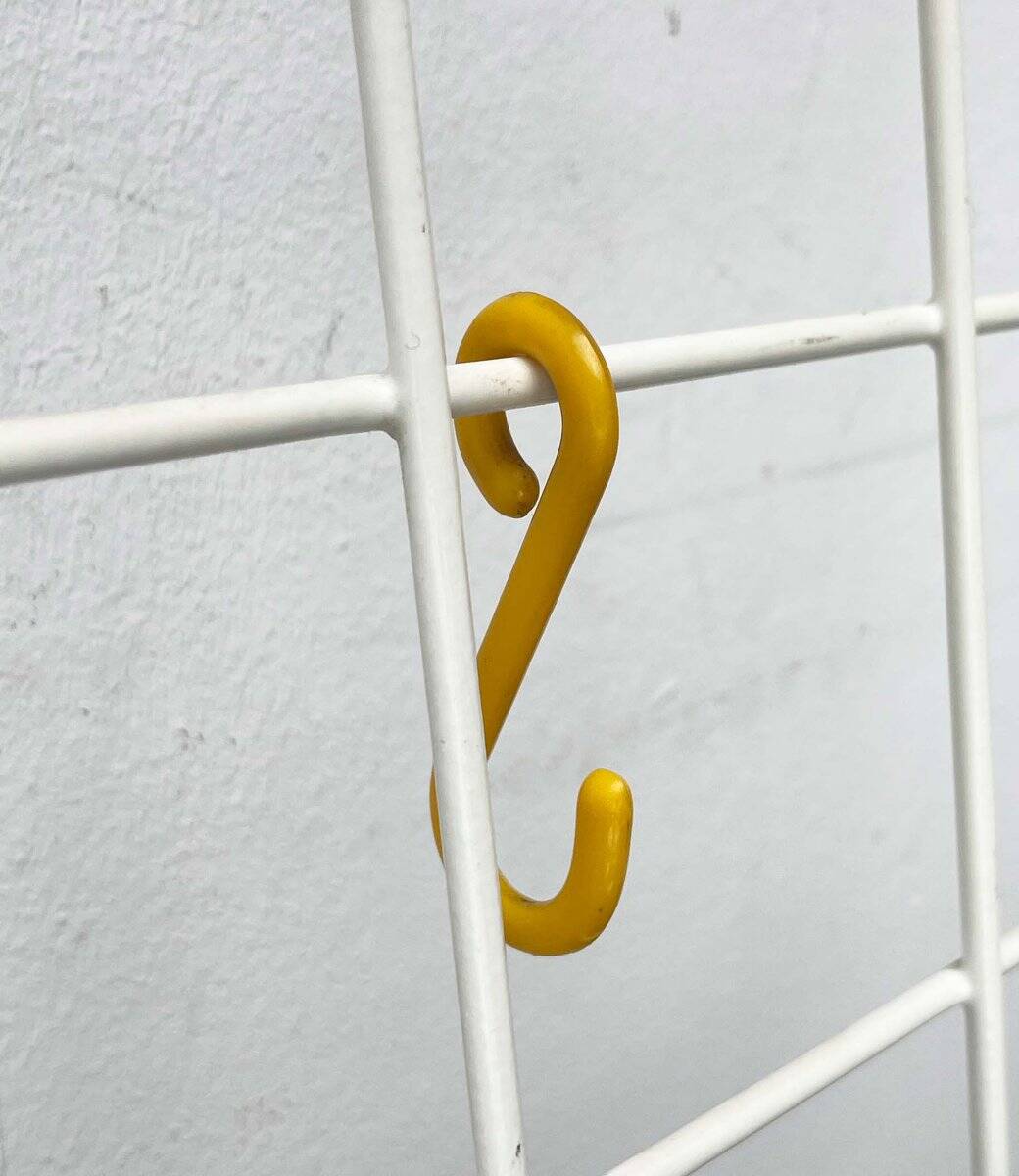 Minimalist white German mid-century coat rack with strings from the 1960s.