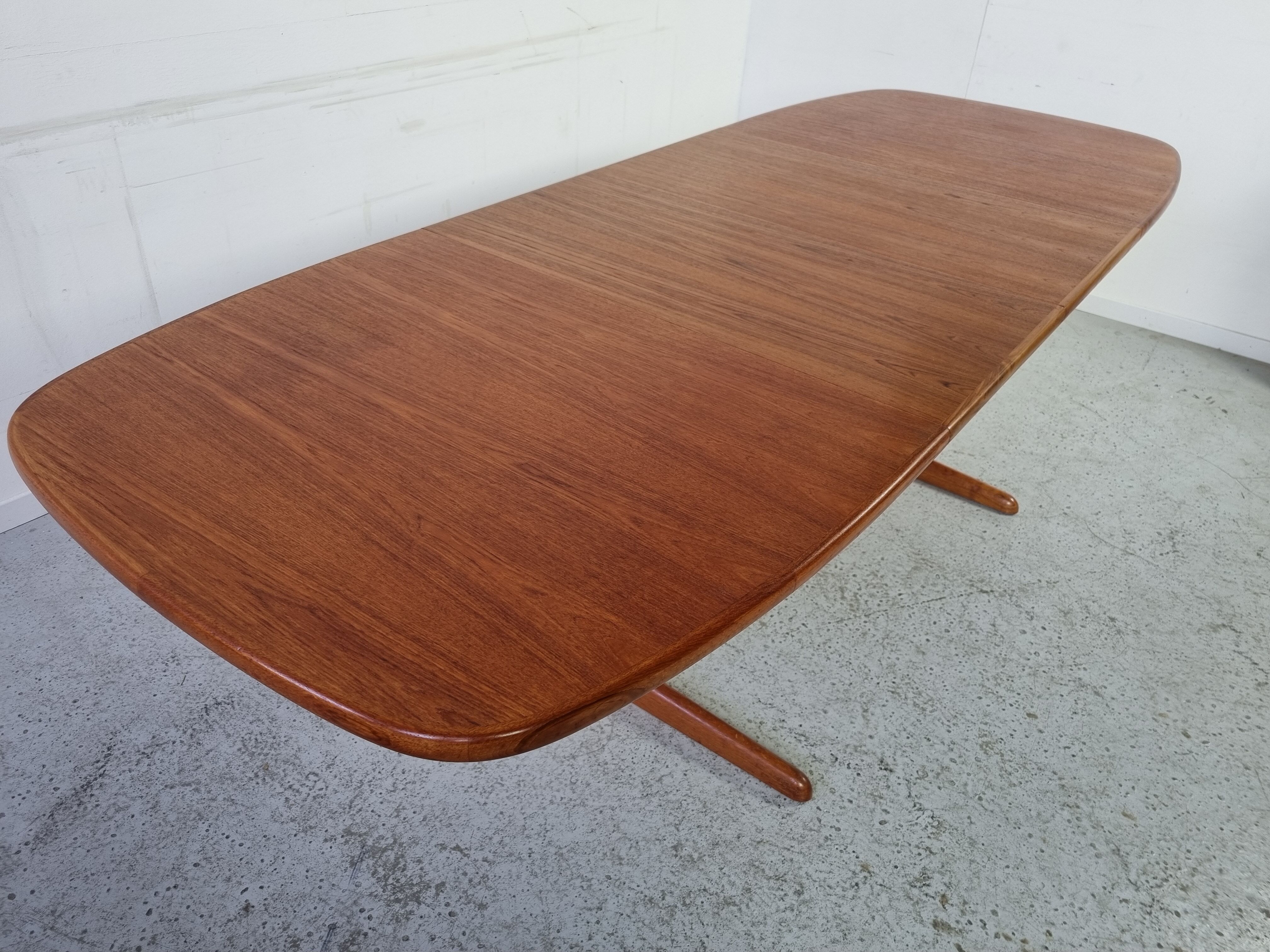 Extendable teak dining table from Dyrlund, Denmark 60s