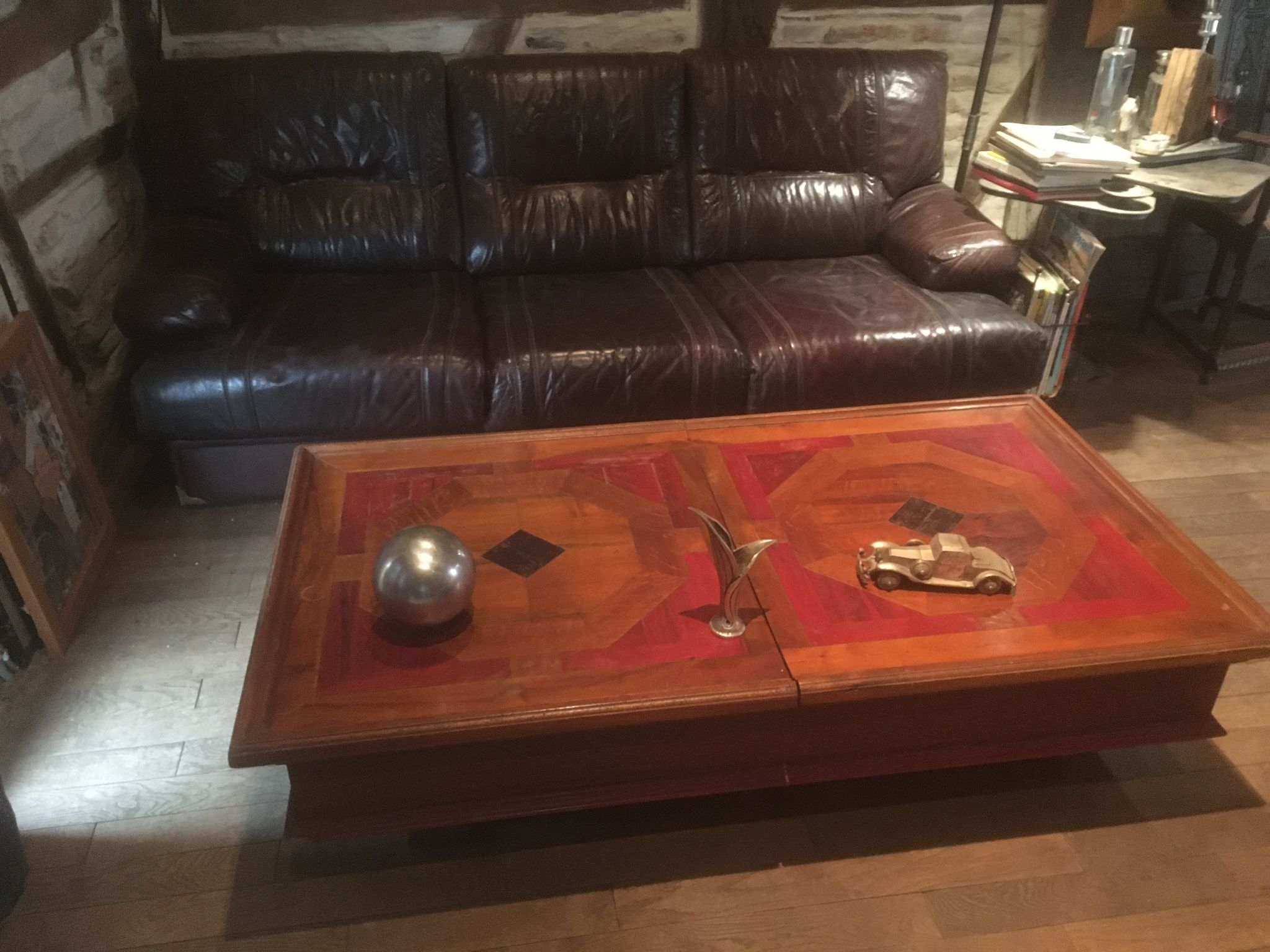 Coffee table with storage for bottles and glasses in oak.