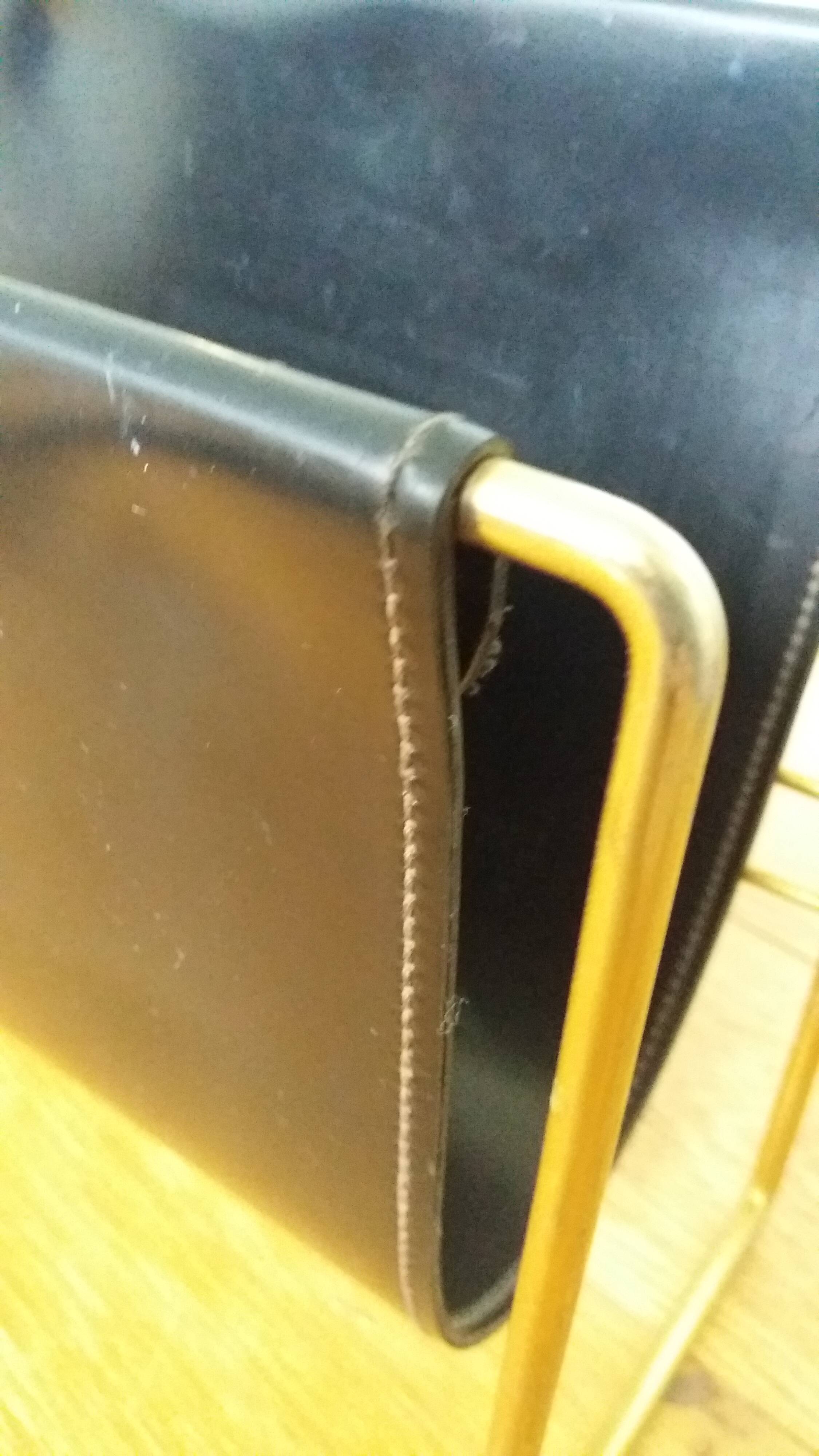 Modernist magazine rack in the style of Jacques Adnet