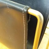 Modernist magazine rack in the style of Jacques Adnet