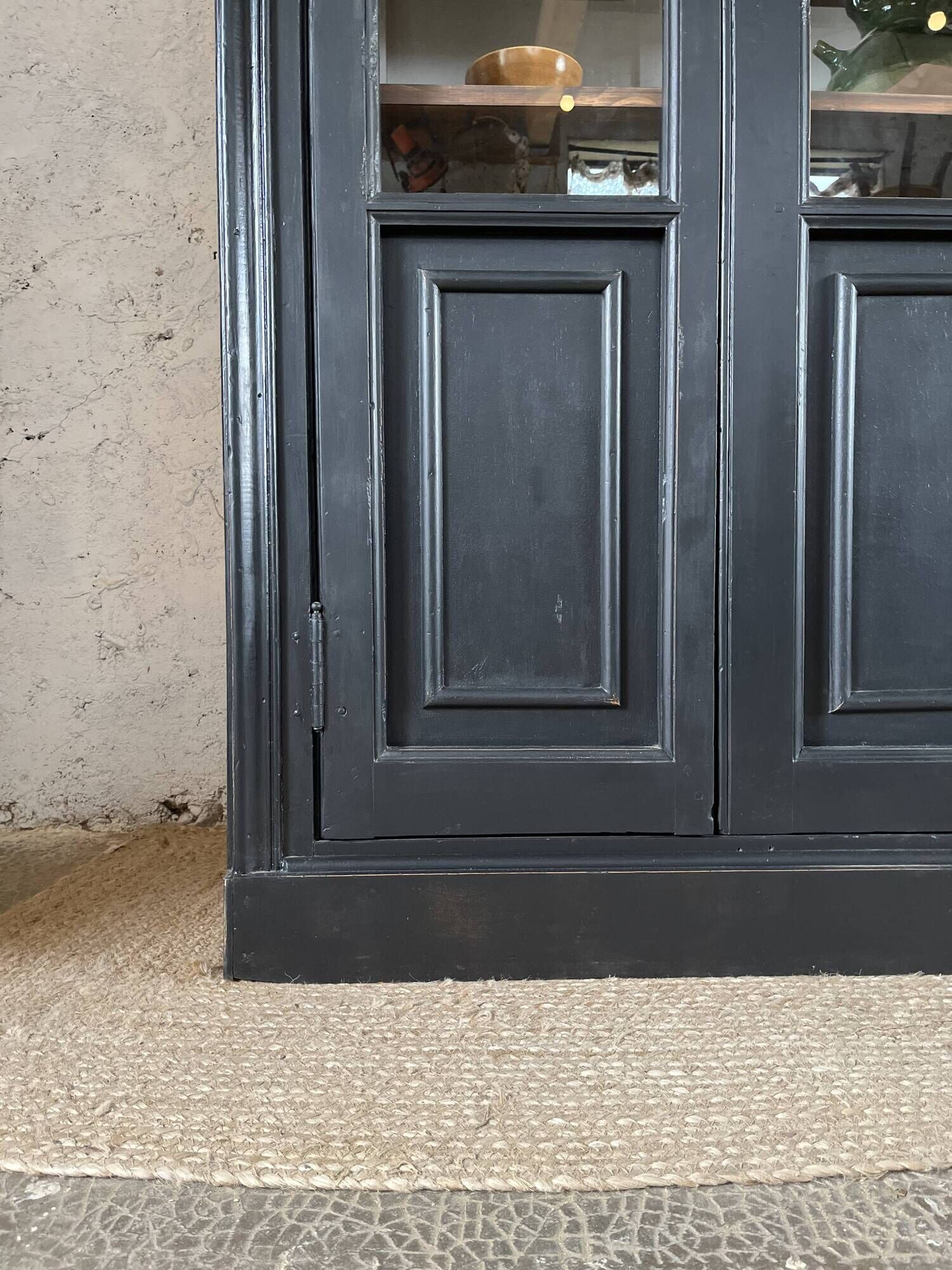 Aged patinated black display cabinet