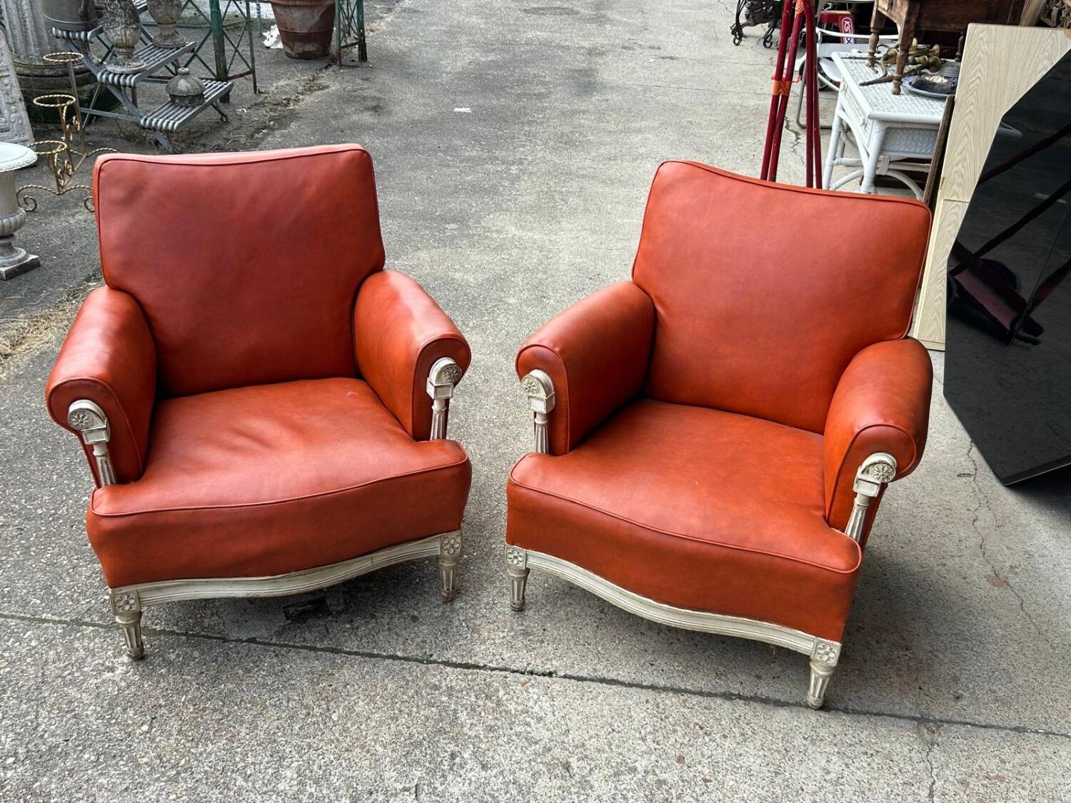 Pair of neoclassical bergère armchairs by Maison Jansen circa 1950.