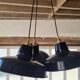 Trio of suspensions in enamelled sheet metal