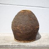 Old basket, burgundy straw and bramble, woven basket, interior decoration, pantry, flowerpot