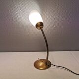 Beautiful table lamp, estimated from the 1950-60s. Made of metal, brass and glass.