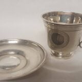 cups and saucers in solid silver