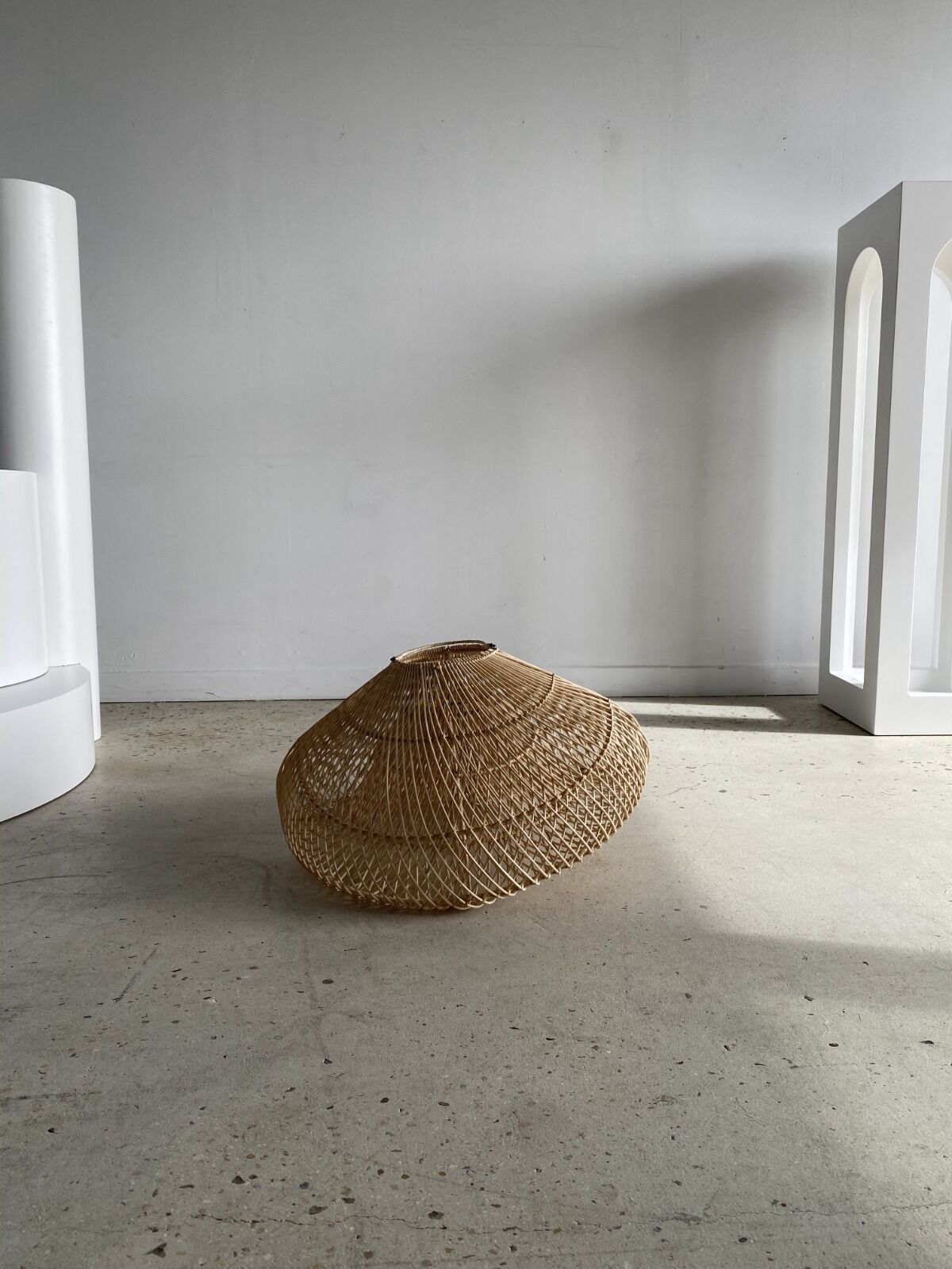 Small rattan lampshade in the shape of a braided hat