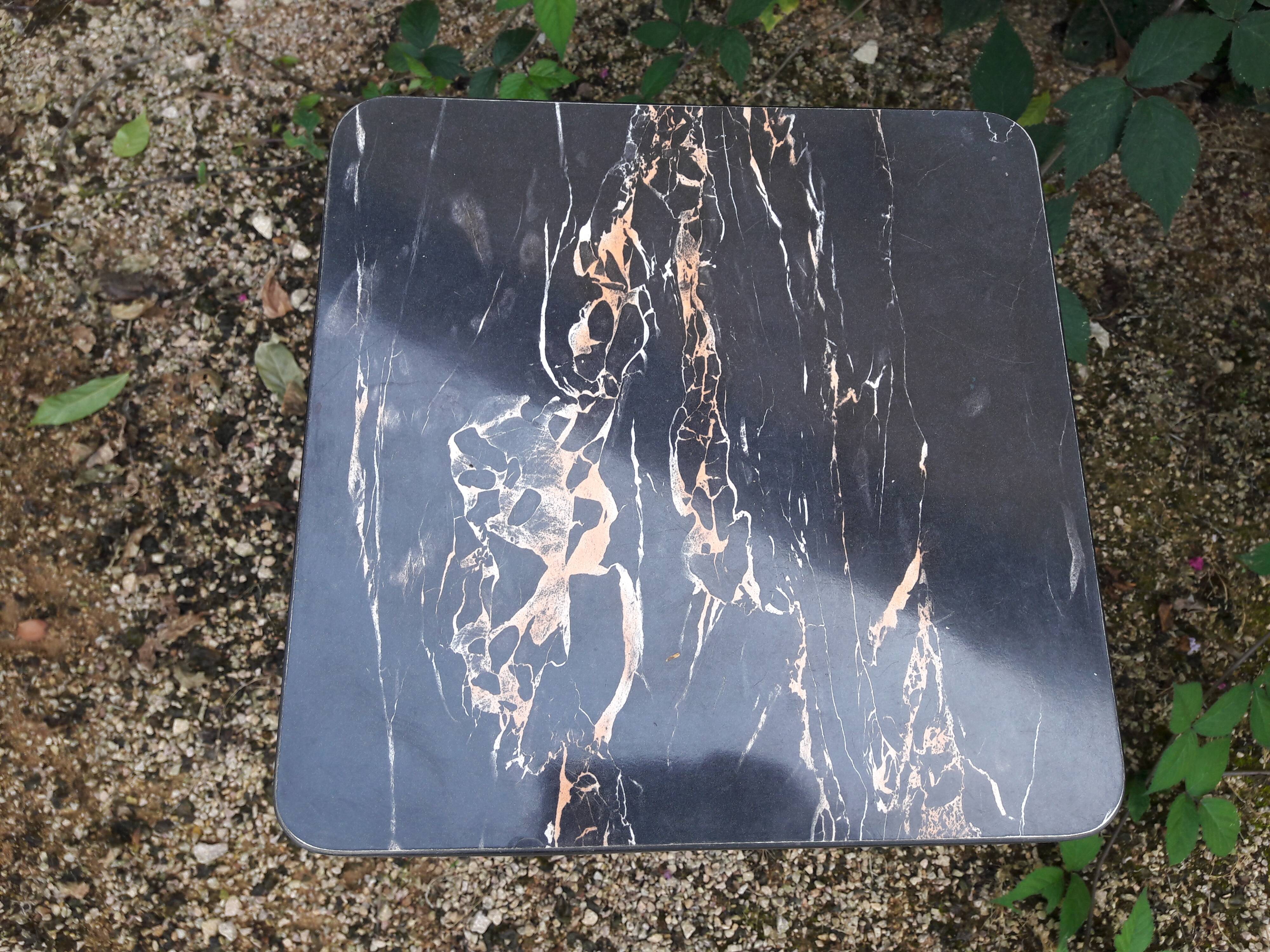 High stool in marbled black formica