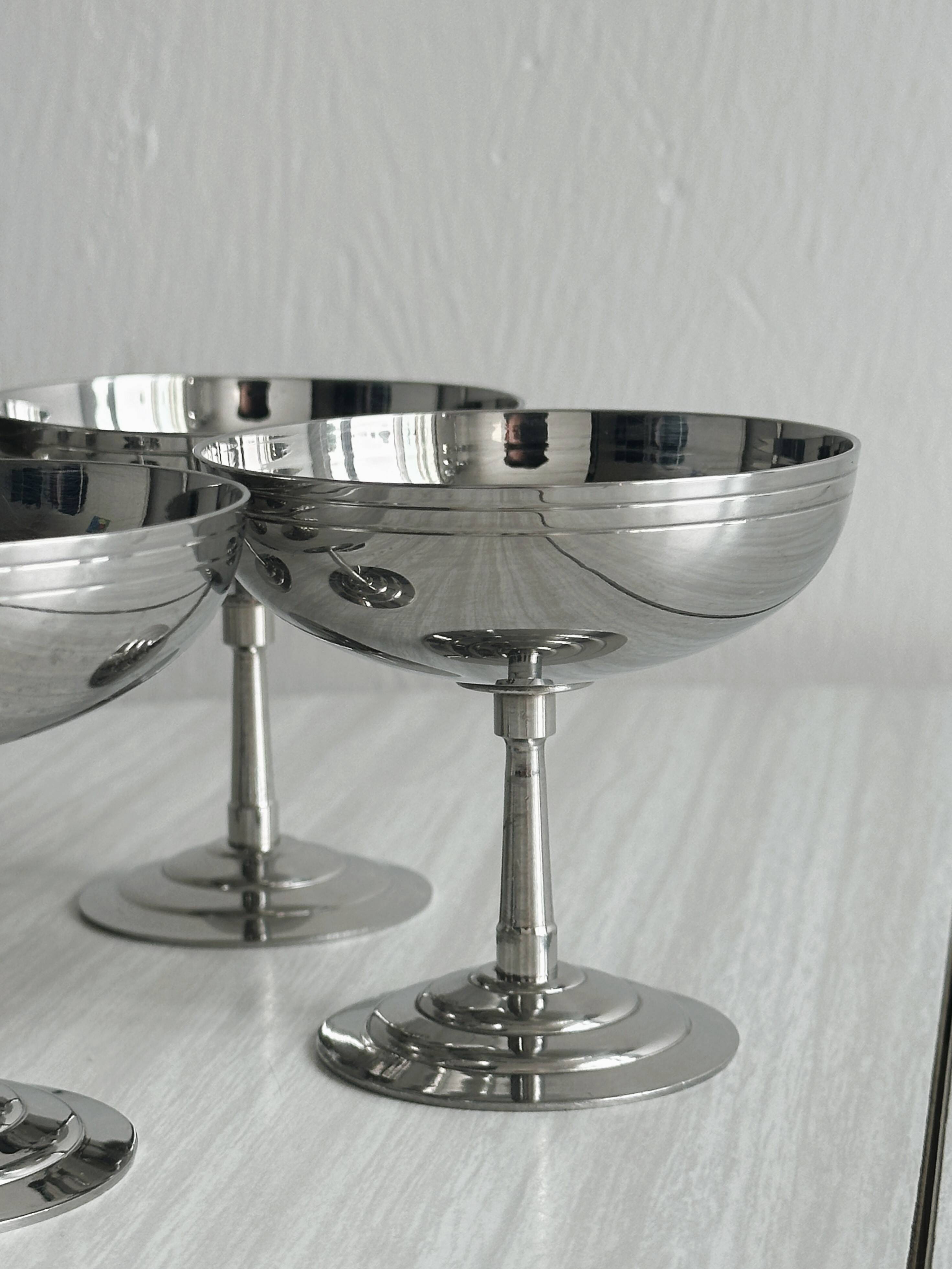 6 Letang Remy shiny stainless steel footed bowls.