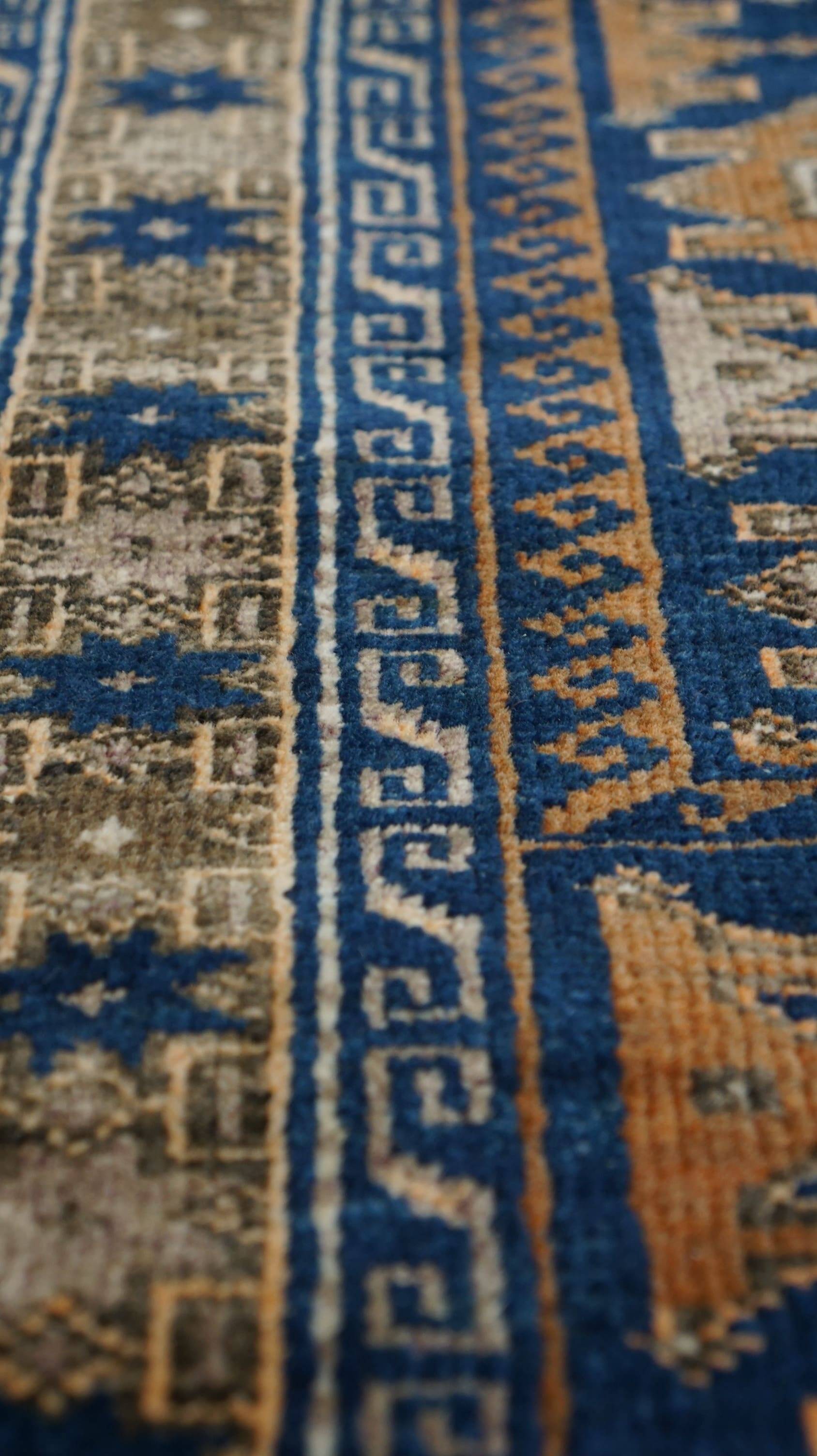 Orange and blue Persian rug 132×83 cm