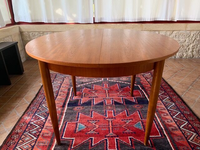 Expandable teak dining table, butterfly extension, circa 60s