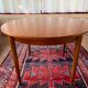Expandable teak dining table, butterfly extension, circa 60s