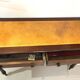 Antique English writing desk in mahogany and gilded leather.