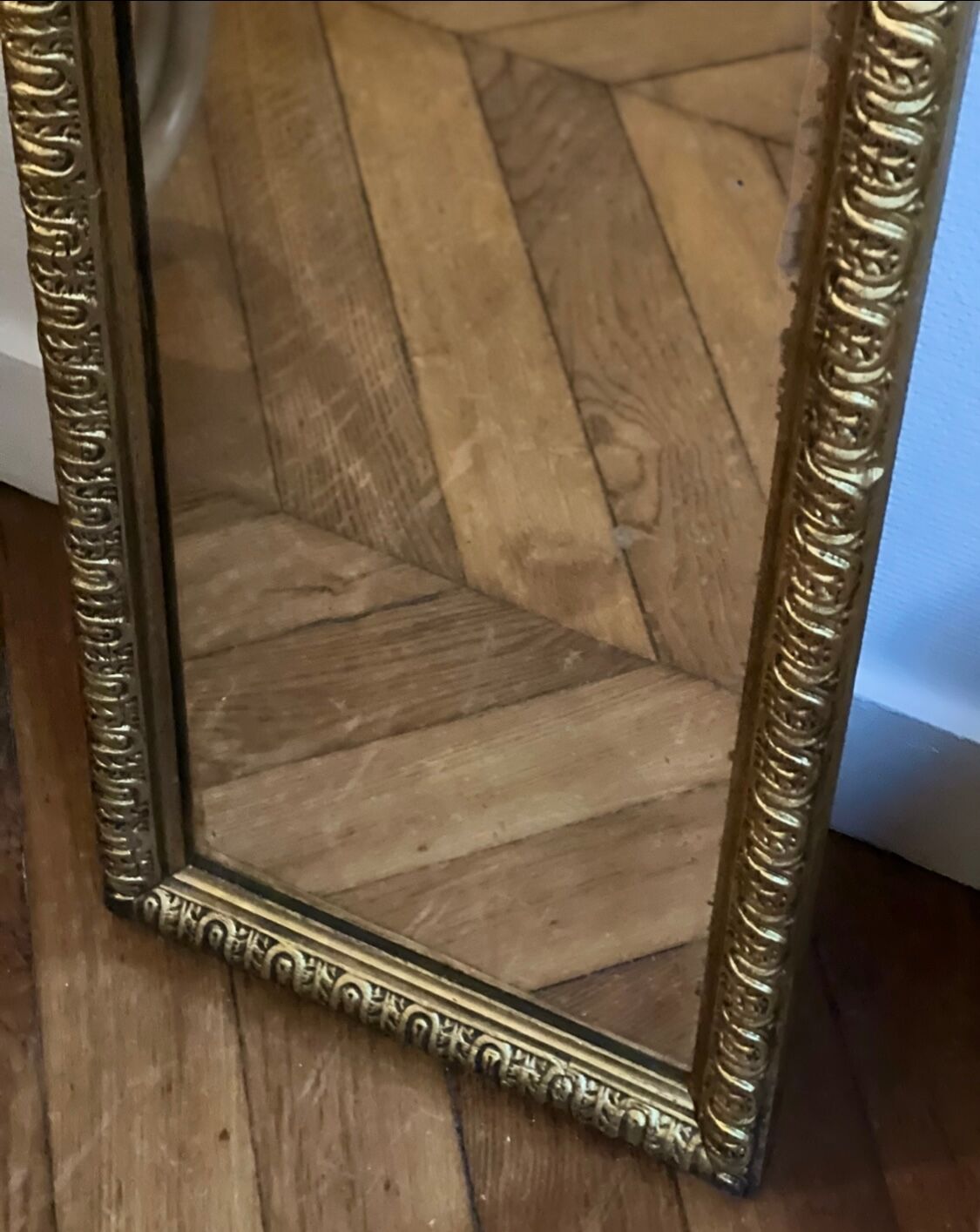Old rectangular mirror between two golden Louis Philippe