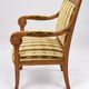 Antique armchair with wooden crossbars – Restoration style