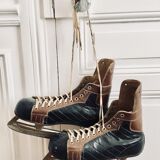 Pair of vintage lutra ice skates