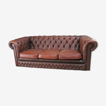 Brown leather chesterfield sofa