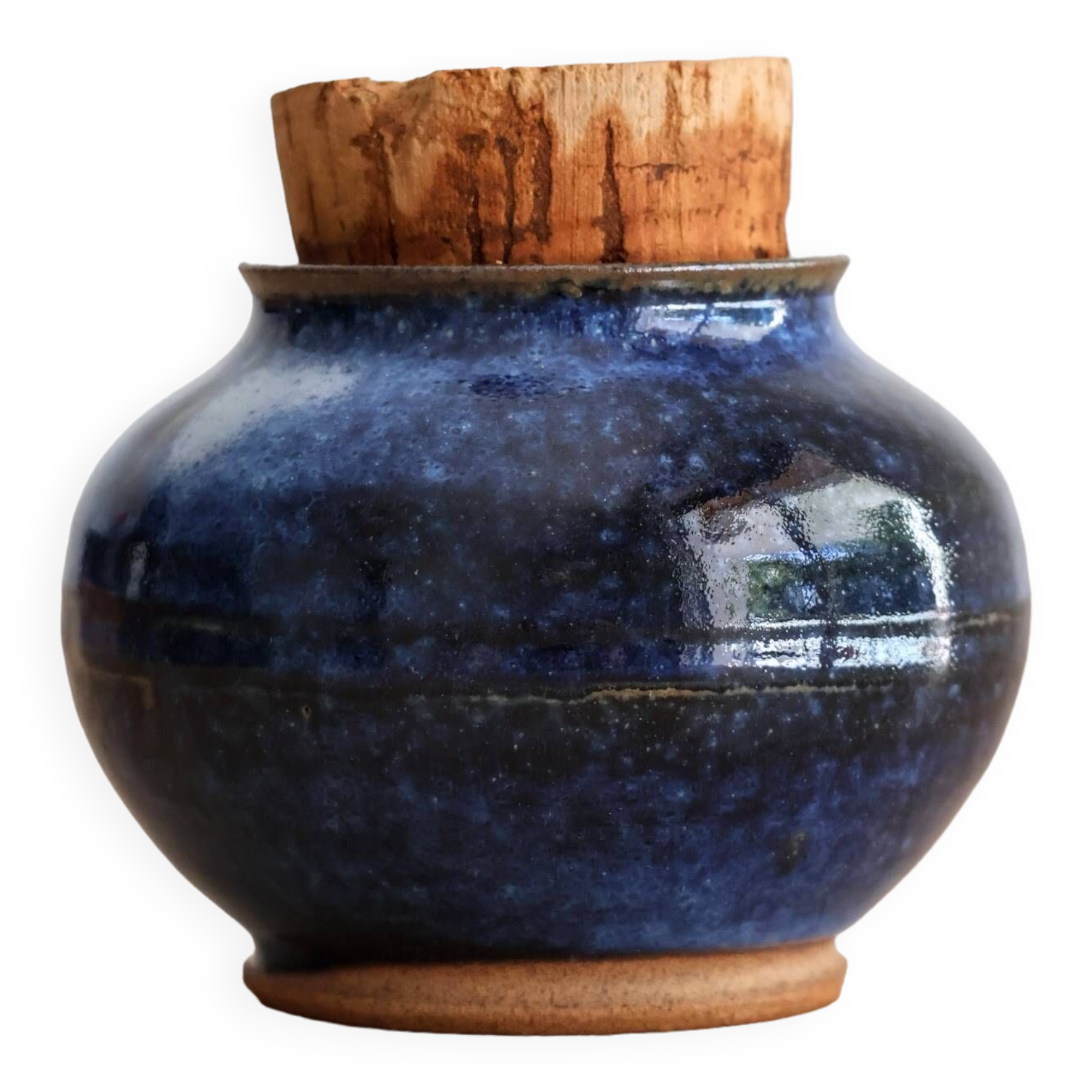 Blue glazed stoneware pot with cork stopper
