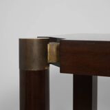 Pair of mahogany and brass consoles, 1970s.