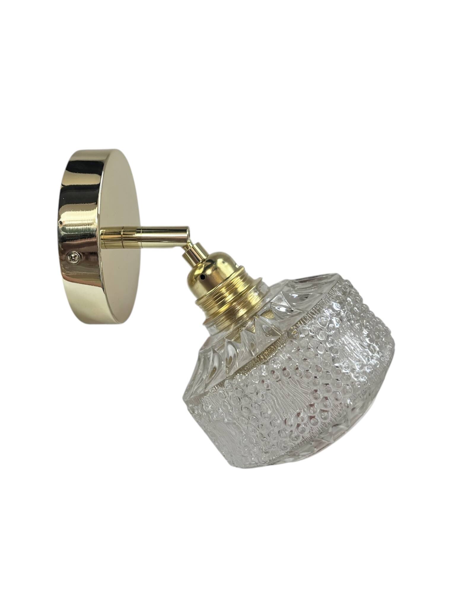 Gold tilting wall light