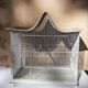 Cage à oiseau en fer et osier