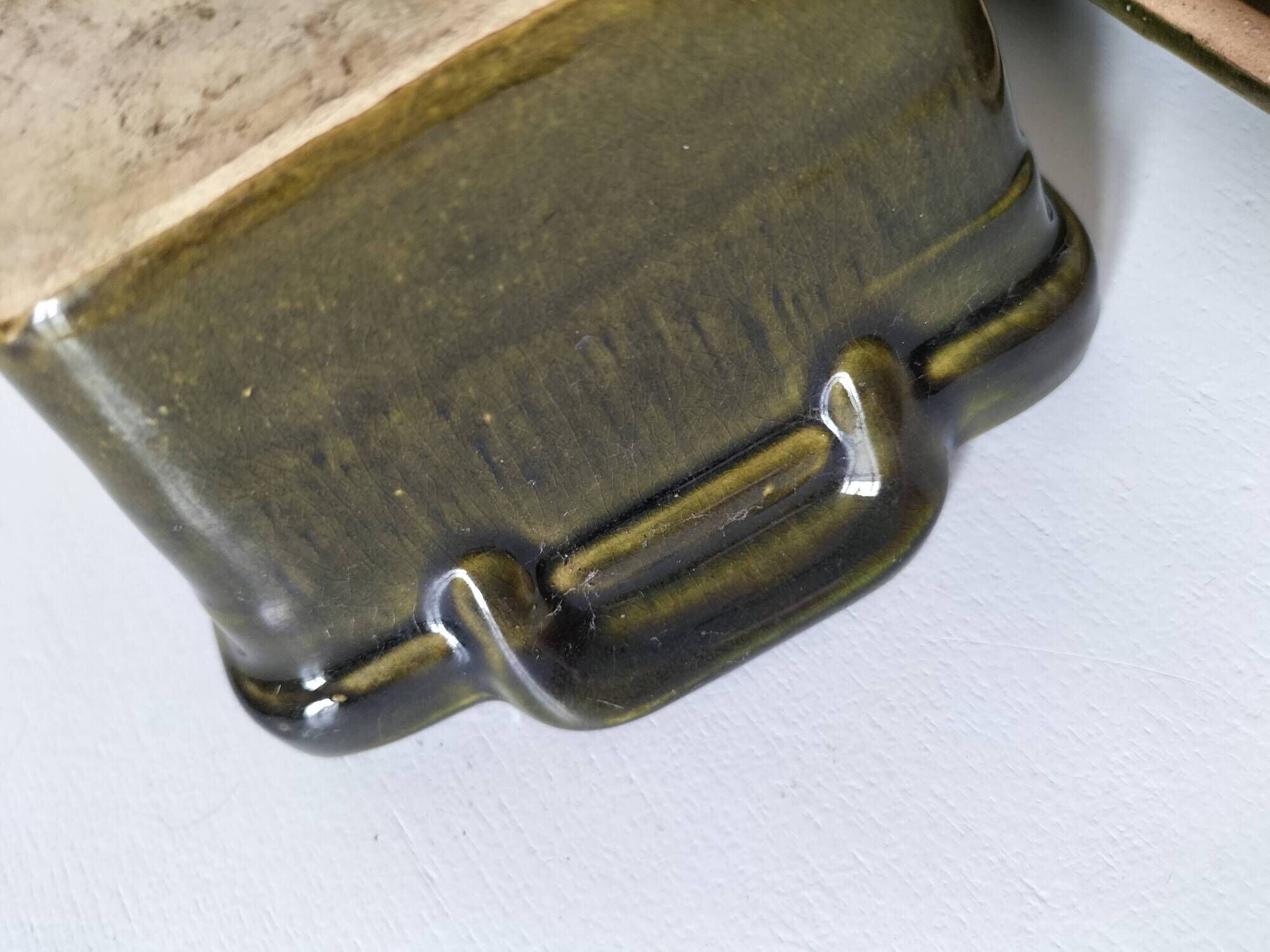Small terrine in olive green glazed earthenware