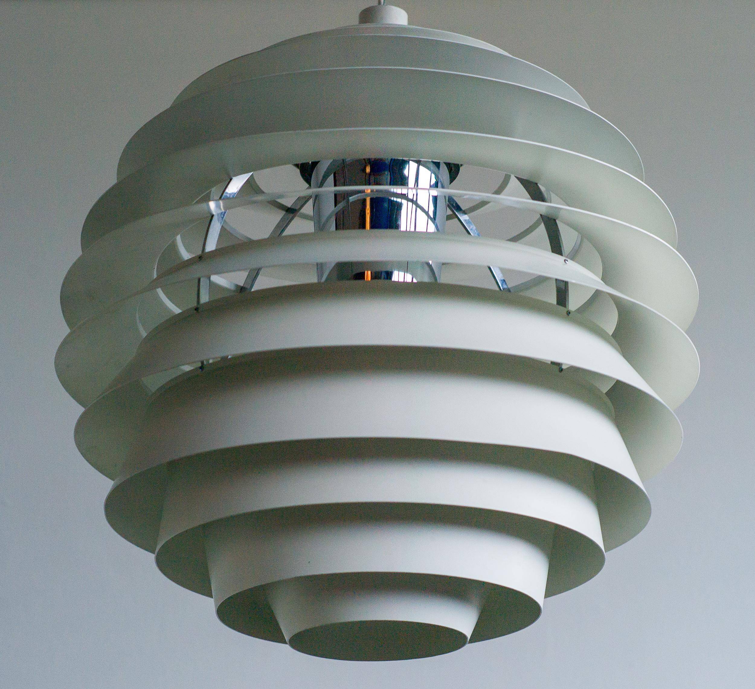 Large pendants from the early last century from the Louvre by Poul Henningsen for Louis Poulsen, 1962.