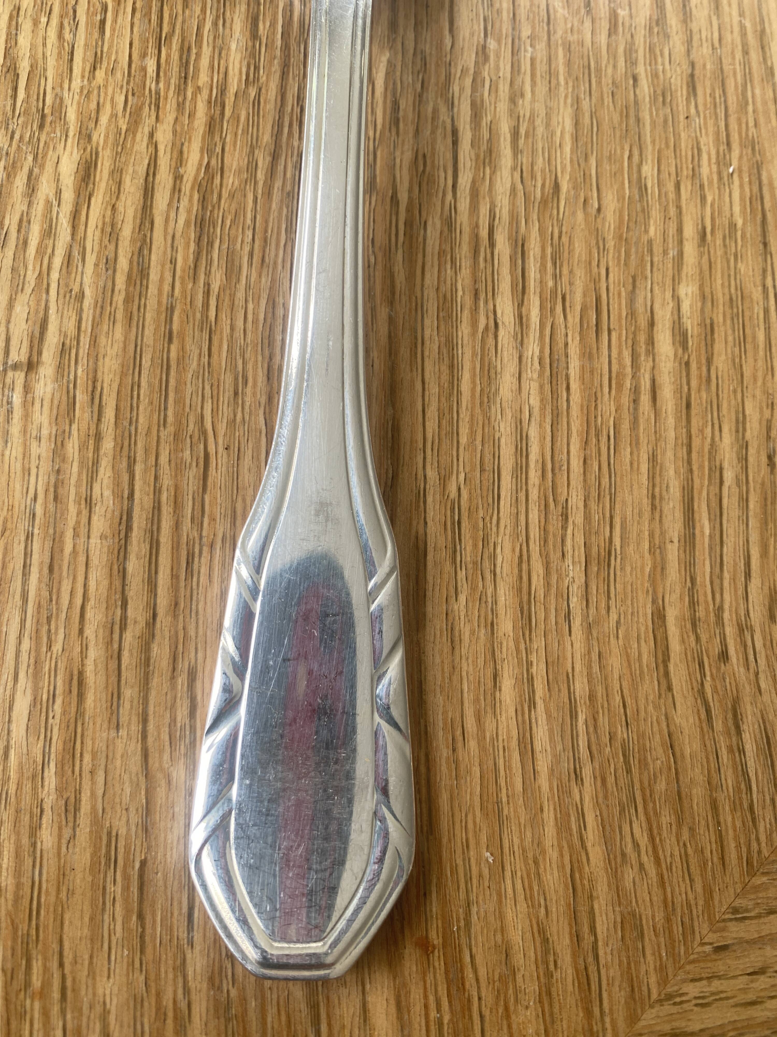 8 large silver-plated metal Art Deco spoons