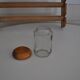 Brown wooden wall spice rack with a set of 6 glass jars, 1950s vintage style.