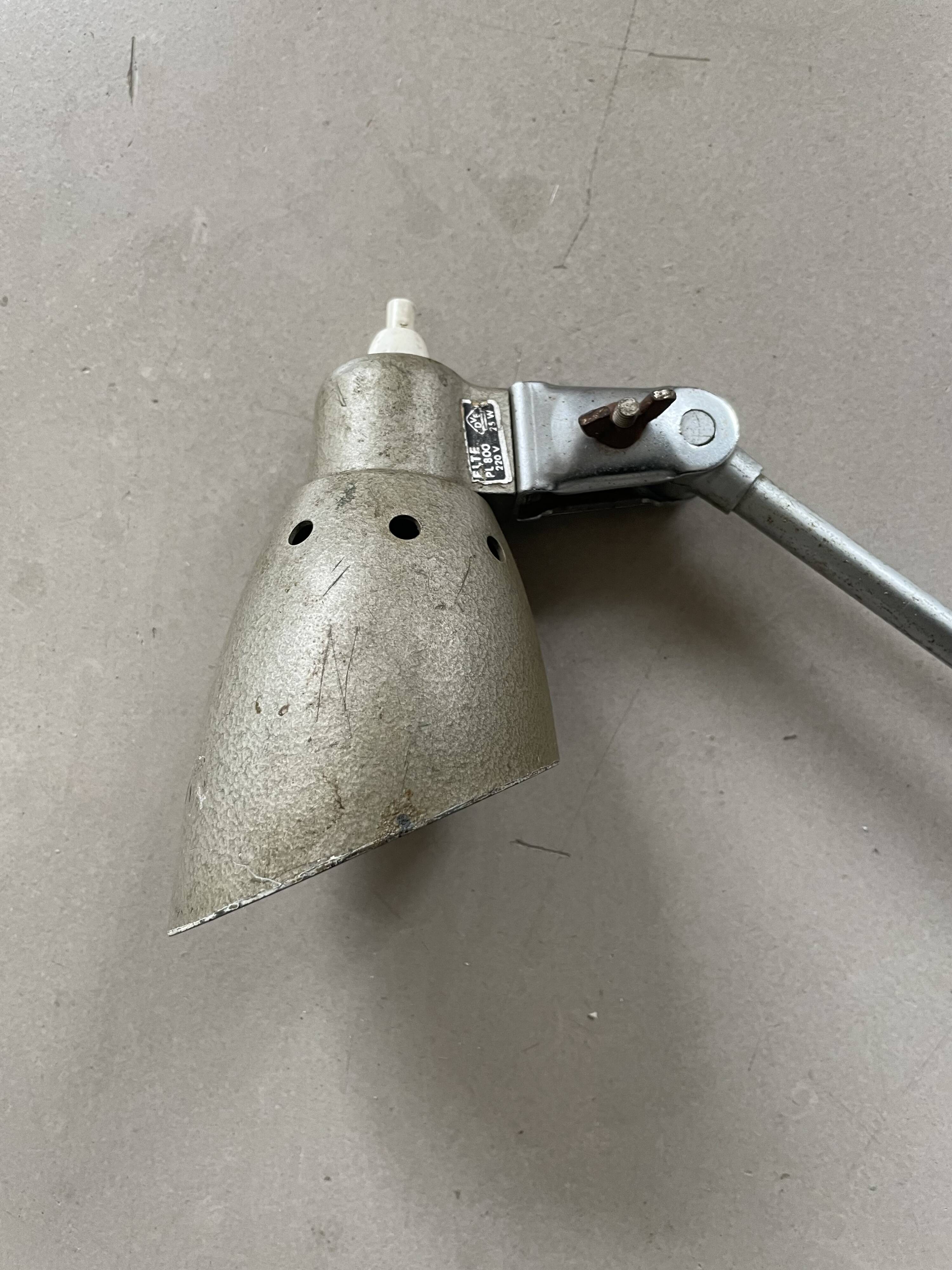 Old industrial articulated lamp