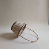 Round wicker basket in light wood