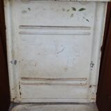 White ladle hangs with bowl