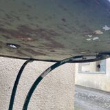 Old wrought iron garden table