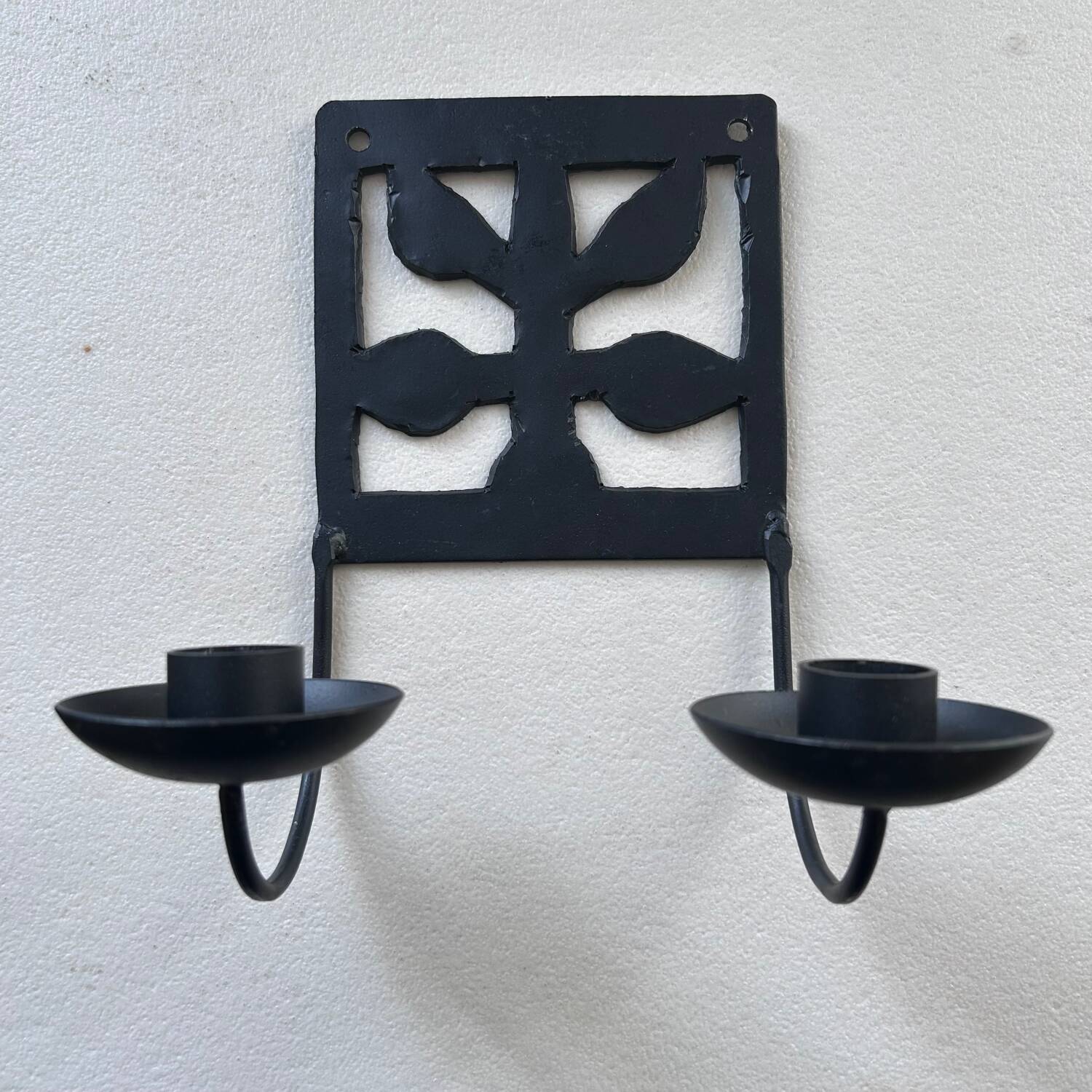 Wrought iron wall candle holder