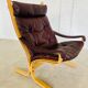 Vintage mid-century scandinavian brown leather lounge chair by ingmar relli