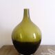 dark green drop-shaped glass vase