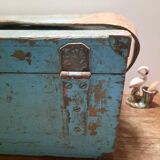Old wooden trunk with blue patina